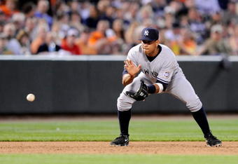 BALTIMORE - MAY 09:  Alex Rodriguez #13 of the New York Yankees fields a ground ball against the Baltimore Orioles at Oriole Park at Camden Yards on May 9, 2009 in Baltimore, Maryland.  (Photo by Greg Fiume/Getty Images)