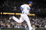LOS ANGELES, CA - APRIL 30:  Manny Ramirez #99 of the Los Angeles Dodgers hits a homerun for a 4-3 lead against the San Diego Padres during the third inning at Dodger Stadium on April 30, 2009 in Los Angeles, California.  (Photo by Harry How/Getty Images)