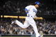 LOS ANGELES, CA - APRIL 30: Manny Ramirez #99 of the Los Angeles Dodgers hits a homerun for a 4-3 lead against the San Diego Padres during the third inning at Dodger Stadium on April 30, 2009 in Los Angeles, California. (Photo by Harry How/Getty Images)