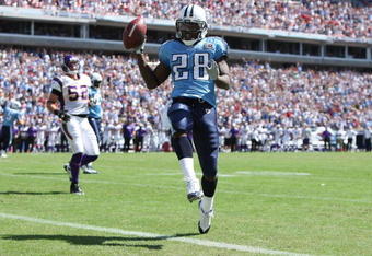 NASHVILLE, TN - SEPTEMBER 28:  Running back Chris Johnson #28 of the Tennessee Titans celebrates as he scores a touchdown against the Minnesota Vikings at LP Field on September 28, 2008 in Nashville, Tennessee.  (Photo by Doug Benc/Getty Images)