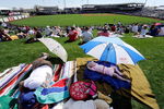 SURPRISE, AZ - FEBRUARY 27:  Chicago Cubs fan Annika King, 1-years-old, and her grandfather Tom Cowley, from Mesa, Arizona, take a nap under the shade of umbrellas on the grass in center field during a Chicago Cubs and Texas Rangers spring training game at the Surprise Stadium on February 27, 2009 in Surprise, Arizona.  (Photo by Kevork Djansezian/Getty Images)