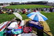 SURPRISE, AZ - FEBRUARY 27:  Chicago Cubs fan Annika King, 1-years-old, and her grandfather Tom Cowley, from Mesa, Arizona, take a nap under the shade of umbrellas on the grass in center field during a Chicago Cubs and Texas Rangers spring training game at the Surprise Stadium on February 27, 2009 in Surprise, Arizona.  (Photo by Kevork Djansezian/Getty Images)