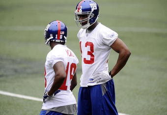 EAST RUTHERFORD, NJ - MAY 09:  Ramses Barden #13 and Hakeem Nicks #18 of the New York Giants works out at rookie camp on May 9, 2009 in East Rutherford, New Jersey.  (Photo by Jeff Zelevansky/Getty Images)