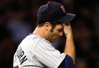 CHICAGO - SEPTEMBER 30:  Starting pitcher Nick Blackburn #53 of the Minnesota Twins wipes his forehead against the Chicago White Sox during the American League Central Division Tiebreaker game at U.S. Cellular Field on September 30, 2008 in Chicago, Illinois.  (Photo by Jamie Squire/Getty Images)