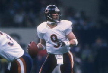26 Jan 1986: Quarterback Jim McMahon of the Chicago Bears looks to pass the ball against the New England Patriots during Super Bowl XX at the Superdome in New Orleans, Louisiana. The Bears won the game, 46-10.