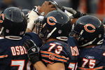 CHICAGO - AUGUST 21: Members of the Chicago Bear defense including Nick Osborn #79, Dan Bazuin #73 and Matt Toeaina #75 prepare to play against the San Francisco 49ers on August 21, 2008 at Soldier Field in Chicago, Illinois.The 49ers defeated the Bears 37-30.  (Photo by Jonathan Daniel/Getty Images)