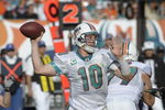 MIAMI, FL - JANUARY 4:  Quarterback Chad Pennington #10 of the Miami Dolphins sets to pass against the Baltimore Ravens in an NFL Wildcard Playoff Game at Dolphins Stadium on January 4, 2009 in Miami, Florida.  (Photo by Al Messerschmidt/Getty Images) 