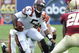 TAMPA, FL - DECEMBER 6: Quarterback Tyron Taylor #5 of the Virginia Tech Hokies rushes upfield against the Boston College Eagles in the 2008 ACC Football Championship game at Raymond James Stadium on December 6, 2008 in Tampa, Florida. (Photo by Al Messerschmidt/Getty Images)
