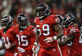 HOUSTON - DECEMBER 01:  DeMeco Ryans #59 of the Houston Texans during play against the Jacksonville Jaguars at Reliant Stadium on December 1, 2008 in Houston, Texas.  (Photo by Ronald Martinez/Getty Images)