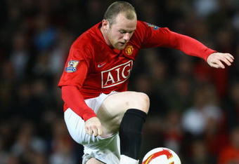 MANCHESTER, UNITED KINGDOM - APRIL 22:   Wayne Rooney of Manchester United in action during the Barclays Premier League match between Manchester United and Portsmouth at Old Trafford on April 22, 2009 in Manchester, England. (Photo by Alex Livesey/Getty Images)