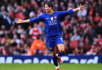 LONDON, ENGLAND - MAY 05:  Cristiano Ronaldo of Manchester United celebrates scoring the second goal of the game during the UEFA Champions League Semi Final Second Leg match between Arsenal and Manchester United at Emirates Stadium on May 5, 2009 in London, England.  (Photo by Shaun Botterill/Getty Images)