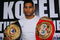LONDON, ENGLAND - APRIL 22:  Amir Khan  poses with his belts at the press conference prior to his forthcoming WBA Light-welterweight fight against Andreas Kotelnik of the Ukraine at O2 Arena on April 22, 2009 in London, England.  (Photo by John Gichigi/Getty Images)