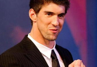 PHOENIX - MARCH 28:  Olympic swimmer Michael Phelps speaks on stage during Muhammad Ali's Celebrity Fight Night XV held at the JW Marriott Desert Ridge Resort & Spa on March 28, 2009 in Phoenix, Arizona.  (Photo by Michael Buckner/Getty Images for Celebrity Fight Night)