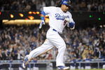 LOS ANGELES, CA - APRIL 30:  Manny Ramirez #99 of the Los Angeles Dodgers hits a homerun for a 4-3 lead against the San Diego Padres during the third inning at Dodger Stadium on April 30, 2009 in Los Angeles, California.  (Photo by Harry How/Getty Images)