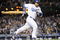 LOS ANGELES, CA - APRIL 30:  Manny Ramirez #99 of the Los Angeles Dodgers hits a homerun for a 4-3 lead against the San Diego Padres during the third inning at Dodger Stadium on April 30, 2009 in Los Angeles, California.  (Photo by Harry How/Getty Images)