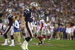 GLENDALE, AZ - FEBRUARY 03:  Quarterback Tom Brady #12 of the New England Patriots walks off the field after losing to the New York Giants 17-14 in Super Bowl XLII on February 3, 2008 at the University of Phoenix Stadium in Glendale, Arizona.  (Photo by Donald Miralle/Getty Images)