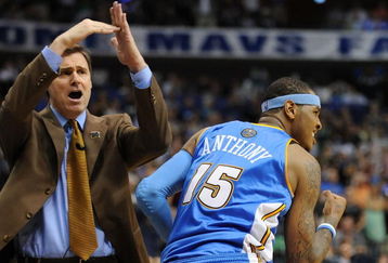 DALLAS - MAY 09:  Forward Carmelo Anthony #15 of the Denver Nuggets reacts after scoring the game winning three-point shot in front of Rick Carlisle of the Dallas Mavericks in Game Three of the Western Conference Semifinals during the 2009 NBA Playoffs at American Airlines Center on May 9, 2009 in Dallas, Texas. NOTE TO USER: User expressly acknowledges and agrees that, by downloading and or using this photograph, User is consenting to the terms and conditions of the Getty Images License Agreement.  (Photo by Ronald Martinez/Getty Images)