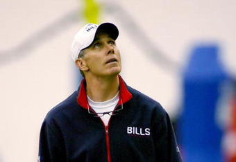 ORCHARD PARK, NY - MAY 01: Dick Jauron, head coach of the Buffalo Bills looks up to a video basket during Buffalo Bills Minicamp at Buffalo Bills Fieldhouse on May 1, 2009 in Orchard Park, New York.  (Photo by Rick Stewart/Getty Images)