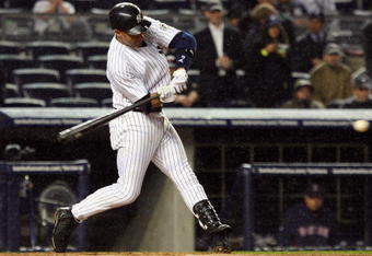 NEW YORK - MAY 05:  Derek Jeter #2 of the New York Yankees bats against the Boston Red Sox on May 5, 2009 at Yankee Stadium in the Bronx borough of New York City. The Red Sox defeated the Yankees 7-3.  (Photo by Jim McIsaac/Getty Images)