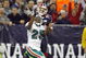 TORONTO, ON - DECEMBER 07:  Will Allen #25 of the Miami Dolphins looks for the reception against Lee Evans #83 of the Buffalo Bills on December 7, 2008 at Rogers Centre in Toronto, Ontario, Canada. The Dolphins won 16-3. (Photo by Rick Stewart/Getty Images)