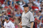 BOSTON - APRIL 25: A.J. Burnett #34 of the New York Yankees reacts after giving up a grand slam to Jason Varitek of the Boston Red Sox at Fenway Park, April 25, 2009, in Boston, Massachusetts. (Photo by Jim Rogash/Getty Images)