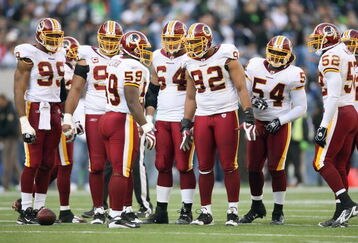 SEATTLE - NOVEMBER 23: London Fletcher #59 of the Washington Redskins leads the huddle during the game against the Seattle Seahawks on November 23, 2008 at Qwest Field in Seattle, Washington. (Photo by Otto Greule Jr/Getty Images)