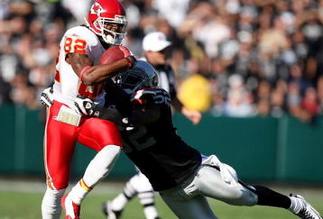 OAKLAND, CA - NOVEMBER 30: Dwayne Bowe #82 of the Kansas City Chiefs catches a pass over Kirk Morrison #52 of the Oakland Raiders during an NFL game on November 30, 2008 at the Oakland-Alameda County Coliseum in Oakland, California. (Photo by Jed Jacobsohn/Getty Images)