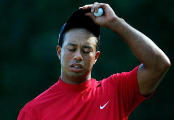 PONTE VEDRA BEACH, FL - MAY 10:  Tiger Woods reacts on green of the 12th hole during the final round of THE PLAYERS Championship on THE PLAYERS Stadium Course at TPC Sawgrass on May 10, 2009 in Ponte Vedra Beach, Florida.  (Photo by Jamie Squire/Getty Images)