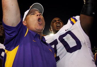 AUBURN, AL - SEPTEMBER 20: Head coach Les Miles and tackle Ciron Black #70 of the LSU Tigers celebrate after defeating the Auburn Tigers at Jordan-Hare Stadium on September 20, 2008 in Auburn, Alabama. (Photo by Doug Benc/Getty Images)
