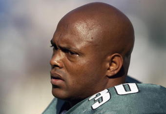 PHILADELPHIA - SEPTEMBER 22:  Running back Brian Mitchell #30 of the Philadelphia Eagles stands on the sideline during the NFL game against the Dallas Cowboys on September 22, 2002 at Veterans Stadium in Philadelphia, Pennsylvania.  The Eagles won 44-13. (Photo by Ezra Shaw/Getty Images)