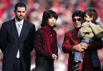 SAN FRANCISCO - NOVEMBER 19:  (L-R) Jed York, Denise DeBartolo York and Eddie DeBartolo look on during a ceremony held in Jerry Rice's honor during half time of the NFL game between the San Francisco 49ers and the Seattle Seahawks at Monster Park on November 19, 2006 in San Francisco, California.  (Photo by Jed Jacobsohn/Getty Images)