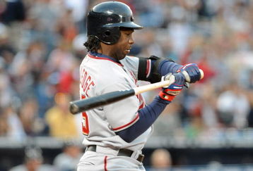 ATLANTA - APRIL 11: Outfielder Lastings Milledge #85 of the Washington Nationals checks a swing against the Atlanta Braves on April 11, 2009 at Turner Field in Atlanta, Georgia.  (Photo by Al Messerschmidt/Getty Images) 