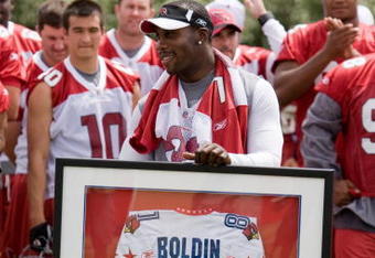 TEMPE, AZ - MAY 2 :  Anquan Boldin #81 of the Arizona Cardinals is presented with his 2009 Pro Bowl jersey during a team minicamp at the team training facility on May 2, 2009 in Tempe, Arizona.  (Photo by Jonathan Willey/Getty Images)