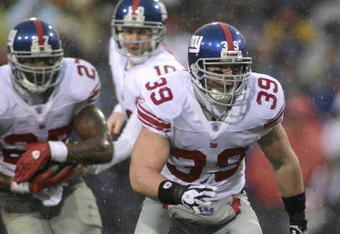 ORCHARD PARK, NY - DECEMBER 23:  Madison Hedgecock #39 of the New York Giants prepares to block for Brandon Jacobs during the game against the Buffalo Bills on December 23, 2007 at Ralph Wilson Stadium in Orchard Park, New York. (Photo by Rick Stewart/Getty Images)