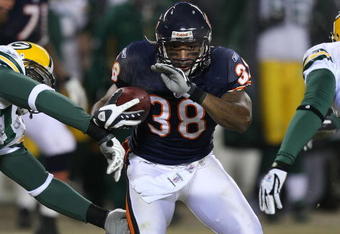 CHICAGO - DECEMBER 22: Danieal Manning #38 of the Chicago Bears returns a kick-off against the Green Bay Packers on December 22, 2008 at Soldier Field in Chicago, Illinois. The Bears defeated the Packers 20-17 in overtime. (Photo by Jonathan Daniel/Getty Images)