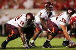 RALEIGH, NC - SEPTEMBER 4:  Quarterback Marcus Vick #5 of the Virginia Polytechnic Institute and State University Hokies prepares to snap the ball during the game against the North Carolina State University Wolfpack at Carter-Finley Stadium on September 4, 2005 in Raleigh, North Carolina.  Virginia Tech won 20-16.  (Photo by Streeter Lecka/Getty Images)