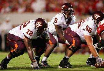 RALEIGH, NC - SEPTEMBER 4:  Quarterback Marcus Vick #5 of the Virginia Polytechnic Institute and State University Hokies prepares to snap the ball during the game against the North Carolina State University Wolfpack at Carter-Finley Stadium on September 4, 2005 in Raleigh, North Carolina.  Virginia Tech won 20-16.  (Photo by Streeter Lecka/Getty Images)