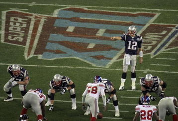 GLENDALE, AZ - FEBRUARY 03:  Tom Brady #12 of the New England Patriots against the New York Giants during Super Bowl XLII on February 3, 2008 at the University of Phoenix Stadium in Glendale, Arizona.  (Photo by Doug Pensinger/Getty Images)