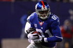 EAST RUTHERFORD, NJ - DECEMBER 21:  Amani Toomer #81 of the New York Giants runs the ball against the Carolina Panthers on December 21, 2008 at Giants Stadium in East Rutherford, New Jersey.  (Photo by Jim McIsaac/Getty Images)