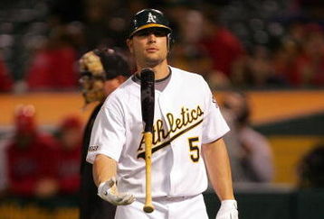 OAKLAND, CA - MAY 04:  Matt Holliday #5 of the Oakland Athletics tosses his bat in the air after he struck out in the eighth inning of their game against the Los Angeles Angels of Anaheim on May 4, 2009 at the Oakland Coliseum in Oakland, California.  (Photo by Ezra Shaw/Getty Images)