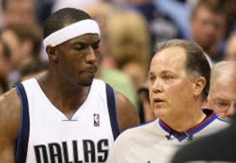 DALLAS - MAY 09:  Forward Josh Howard #5 of the Dallas Mavericks talks with NBA referee Mark Wunderlich after a 106-105 loss against the Denver Nuggets in Game Three of the Western Conference Semifinals during the 2009 NBA Playoffs at American Airlines Center on May 9, 2009 in Dallas, Texas. NOTE TO USER: User expressly acknowledges and agrees that, by downloading and or using this photograph, User is consenting to the terms and conditions of the Getty Images License Agreement.  (Photo by Ronald Martinez/Getty Images)