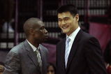 HOUSTON - MAY 10:  Center Dikembe Mutombo and Yao Ming of the Houston Rockets during Game Four of the Western Conference Semifinals during the 2009 NBA Playoffs at Toyota Center on May 10, 2009 in Houston, Texas. NOTE TO USER: User expressly acknowledges and agrees that, by downloading and or using this photograph, User is consenting to the terms and conditions of the Getty Images License Agreement.  (Photo by Ronald Martinez/Getty Images)