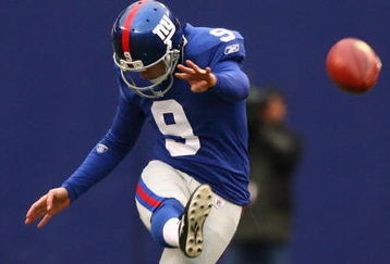 EAST RUTHERFORD, NJ - NOVEMBER 16:  Lawrence Tynes #9 of the New York Giants kicks off against the Baltimore Ravens during their game on November 16, 2008 at Giants Stadium in East Rutherford, New Jersey.  (Photo by Al Bello/Getty Images)