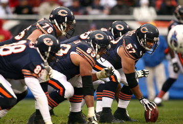 CHICAGO - NOVEMBER 09:  Olin Kreutz #57 of the Chicago Bears centers the ball at the line of scrimmage against the Tennessee Titans at Soldier Field on November 9, 2008 in Chicago, Illinois. The Titans won 21-14. (Photo by Jonathan Ferrey/Getty Images)
