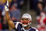 FOXBORO, MA - DECEMBER 23:  Kelley Washington #15 of the New England Patriots tries to fire up the crowd at the start of the game against the Miami Dolphins at Gillette Stadium on December 23, 2007 in Foxboro, Massachusetts.  (Photo by Jim McIsaac/Getty Images)