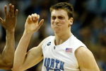 CHARLOTTE, NC - MARCH 15:  Tyler Hansbrough #50 of the North Carolina Tar Heels reacts with teammate Wayne Ellington #22 after Hansbrough made the game-winning shot with .8 seconds left against the Virginia Tech Hokies during the semifinals of the 2008 Men's ACC Basketball Tournament at Bobcats Arena on March 15, 2008 in Charlotte, North Carolina.  (Photo by Kevin C. Cox/Getty Images)