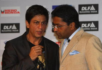 CAPE TOWN, SOUTH AFRICA - APRIL 16:  Lalit Modi (R),  the Chairman of the IPL, and Shah Rukh Khan, the owner of the Kolkata Knight Riders, have a chat at a press conference at the CTICC on April 16, 2009 in Cape Town, South Africa.  (Photo by Tom Shaw/Getty Images)