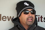 CHICAGO - APRIL 7:  Manager Ozzie Guillen #13 of the Chicago White Sox talks with the press in the dugout before the Opening Day game against the Kansas City Royals on April 7, 2009 at U.S. Cellular Field in Chicago, Illinois. (Photo by Jonathan Daniel/Getty Images) 