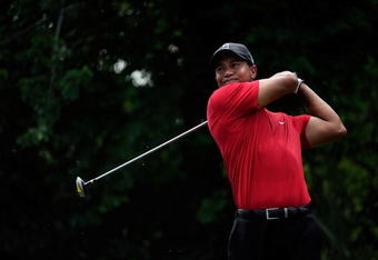 PONTE VEDRA BEACH, FL - MAY 10:  Tiger Woods plays a tee shot during the final round of THE PLAYERS Championship on THE PLAYERS Stadium Course at TPC Sawgrass on May 10, 2009 in Ponte Vedra Beach, Florida.  (Photo by Sam Greenwood/Getty Images)