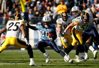 NASHVILLE, TN - DECEMBER 21:  Ryan Clark #25 of the Pittsburgh Steelers tries to tackle Chris Johnson #28 of the Tennessee Titans during their game on December 21, 2008 at LP Field in Nashville, Tennessee.  (Photo by Streeter Lecka/Getty Images)